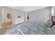 Spacious bedroom with a patterned duvet, soft carpet, and plenty of natural light creates a peaceful retreat at 169 Volti Subito Way, Henderson, NV 89011