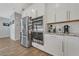 Stainless steel appliances, granite countertops and white cabinets give this kitchen a clean look at 169 Volti Subito Way, Henderson, NV 89011