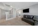 Upstairs loft area featuring plush carpet, neutral paint, and a media area at 169 Volti Subito Way, Henderson, NV 89011