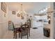 Cozy dining area adjacent to the kitchen with a chandelier and ample natural light at 1911 Winter Hill St, Las Vegas, NV 89106