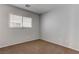 Bedroom with carpeted floors and a window at 214 Bella Matese Ave, Las Vegas, NV 89183
