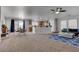 Open concept living area with dining and kitchen views at 214 Bella Matese Ave, Las Vegas, NV 89183