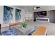 Bright living room with modern decor and entertainment center at 214 Bella Matese Ave, Las Vegas, NV 89183