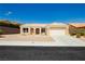 Charming single-story home with desert landscaping and a two-car garage at 2205 Beacon Ridge Dr, Las Vegas, NV 89134