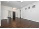 Bright and spacious living room with dark wood floors and plenty of natural light at 2205 Beacon Ridge Dr, Las Vegas, NV 89134