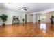 Spacious open floor plan with hardwood floors and access to multiple rooms at 2357 Aztec Ruin Way, Henderson, NV 89044