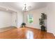 Sun-filled living room boasting hardwood floors, a large window and ample space at 2357 Aztec Ruin Way, Henderson, NV 89044