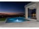 Elegant infinity pool with city views and a soothing waterfall feature at 25 Rockstream Dr, Henderson, NV 89012