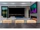 Elegant living room with city views, modern fireplace, and comfortable seating area at 25 Rockstream Dr, Henderson, NV 89012