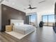 Spacious main bedroom with wood floors, modern design and mountain views at 25 Rockstream Dr, Henderson, NV 89012