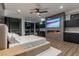 Spacious main bedroom with wood floors, fireplace and city views at 25 Rockstream Dr, Henderson, NV 89012