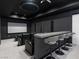 Home theater with comfortable seating, bar and projector at 25 Rockstream Dr, Henderson, NV 89012
