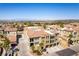 Aerial view of complex featuring tile roofs and well-maintained grounds, showcasing the community's architecture at 2555 Hampton Rd # 2308, Henderson, NV 89052