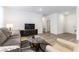 Living room featuring a neutral color palette and open floor plan with wood-look floors at 2555 Hampton Rd # 2308, Henderson, NV 89052
