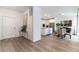 Open-concept living space with modern finishes, wood-look flooring, and a view to kitchen at 2555 Hampton Rd # 2308, Henderson, NV 89052