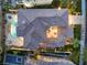 Bird's eye view of the property's unique tiled roof design, complete with a backyard oasis, and lush greenery at 2571 Red Springs Dr, Las Vegas, NV 89135