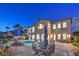 Beautiful backyard with a refreshing pool, outdoor seating, and lush landscaping at 2571 Red Springs Dr, Las Vegas, NV 89135