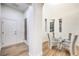 Bright dining area features modern table and chairs with hardwood flooring at 2571 Red Springs Dr, Las Vegas, NV 89135