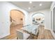 Bright dining room featuring a glass table, modern chairs, and an open layout at 2571 Red Springs Dr, Las Vegas, NV 89135
