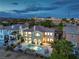 Beautifully landscaped property with a private pool, spa, and a two-story home featuring a welcoming arched entryway at 2571 Red Springs Dr, Las Vegas, NV 89135