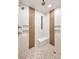 Modern shower with dual shower heads, stylish tile accents, a built-in bench, and integrated shelving at 2571 Red Springs Dr, Las Vegas, NV 89135