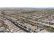 Expansive aerial view of a neighborhood showcasing the well-planned community layout and surrounding landscape at 2932 Tranquil Brook Ave, Henderson, NV 89044