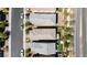 Aerial view of roof tops, green yards, and paved roads at 2932 Tranquil Brook Ave, Henderson, NV 89044
