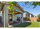 Cozy outdoor backyard with a patio and green turf at 2932 Tranquil Brook Ave, Henderson, NV 89044