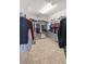 Walk-in closet features ample storage and organized hanging space, perfect for organizing your wardrobe at 2932 Tranquil Brook Ave, Henderson, NV 89044