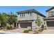 Charming two-story home with a well-maintained front yard and a two-car garage in a lovely neighborhood at 2932 Tranquil Brook Ave, Henderson, NV 89044
