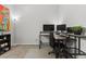 Dedicated office featuring modern computer setup, enhancing productivity in a bright, inviting space at 2932 Tranquil Brook Ave, Henderson, NV 89044