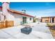 Large backyard features block wall, concrete patio, shed, and outdoor living space at 3016 Light Wind Ct, Las Vegas, NV 89108