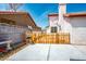 Private backyard featuring a concrete patio area, picket fence, and block wall at 3016 Light Wind Ct, Las Vegas, NV 89108