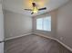 Comfortable bedroom with a ceiling fan and window with blinds at 3038 Tarpon Dr # 203, Las Vegas, NV 89120