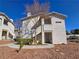 Charming condo with well-maintained landscaping offers a welcoming entrance with a walkway and desert-friendly rock ground cover at 3038 Tarpon Dr # 203, Las Vegas, NV 89120