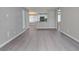 Open-concept living room with seamless flow to the kitchen, featuring sleek flooring and a modern, inviting layout at 3038 Tarpon Dr # 203, Las Vegas, NV 89120