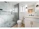 Modern bathroom with sleek vanity, large shower, and contemporary fixtures at 3157 Faiss Dr, Las Vegas, NV 89134