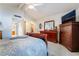 Comfortable bedroom with plush carpeting, ample closet space, and a view of the rest of the home at 3221 Palmdesert Way, Las Vegas, NV 89120