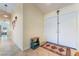 Welcoming entryway with tile flooring and double doors, leading into a bright and inviting home at 3221 Palmdesert Way, Las Vegas, NV 89120