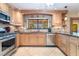 Bright and spacious kitchen featuring stainless steel appliances and ample counter space at 3221 Palmdesert Way, Las Vegas, NV 89120