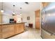 Open-concept kitchen with large island, stainless steel appliances, and ample storage at 3221 Palmdesert Way, Las Vegas, NV 89120