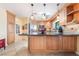 Spacious kitchen with granite countertops, stainless steel appliances, and custom cabinetry at 3221 Palmdesert Way, Las Vegas, NV 89120
