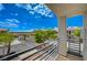 Balcony overlooking parking lot, common area, and building; clear skies on a sunny day at 3318 N Decatur Blvd # 2073, Las Vegas, NV 89130