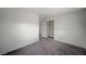 Neutral bedroom featuring gray carpet, a closet, and view to an adjacent space at 3318 N Decatur Blvd # 2073, Las Vegas, NV 89130