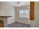 Bright dining area featuring a ceiling fan, large window with blinds, and easy access to the kitchen at 3318 N Decatur Blvd # 2073, Las Vegas, NV 89130