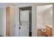 Convenient laundry area with stackable washer/dryer unit and additional cabinet space at 3318 N Decatur Blvd # 2073, Las Vegas, NV 89130