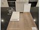 Material board showcasing upgraded cabinet, paint, quartz, luxury vinyl plank, and faucet samples at 3632 Stoppani Ave, Henderson, NV 89044