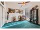 A charming bedroom featuring unique decor, a ceiling fan, and natural lighting at 3924 Quiet Pine St # 201, Las Vegas, NV 89108