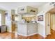 Open kitchen with modern appliances and seamless access to dining and living areas at 3975 N Hualapai Way # 147, Las Vegas, NV 89129
