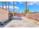 Large backyard patio with mature landscaping and privacy block wall, perfect for outdoor gatherings at 4498 Via San Rafael, Las Vegas, NV 89103